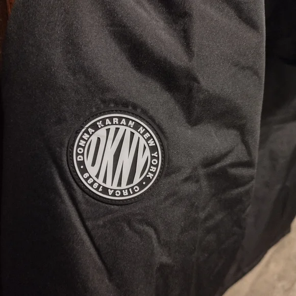 DKNY black hooded jacket Big Girl size medium 10/12. Jackets & Coats